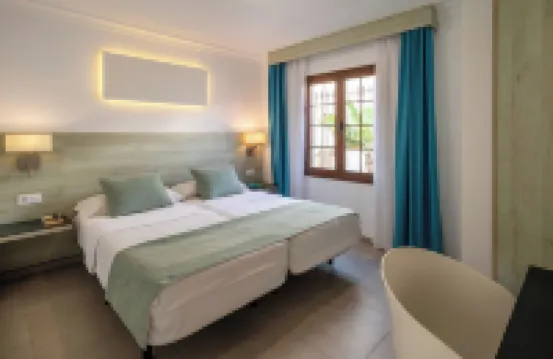 Suite Hotel Montana Club