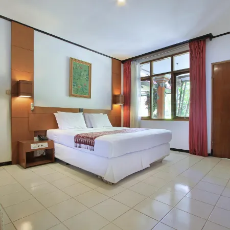 Puri Naga Beachfront Cottages Отели рядом с достопримечательностью «Пляж Дабл-Сикс»