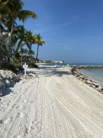 Beach Bliss Awaits: Immaculate Condo Just Steps from Your Private Beach Oasis!