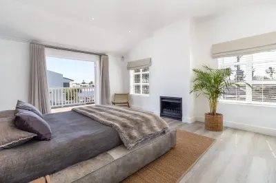 Luxury Flamingo Villa at beach with Pool and Solar Back Up Hotels in Milnerton