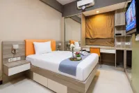 Calming Wooden Touch Studio Room At Apartment Soekarno Hatta (Suhat) Malang - Apartments