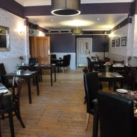 Inn at the Park Hotel Отели рядом с достопримечательностью «Ботанический сад Johnston Gardens»
