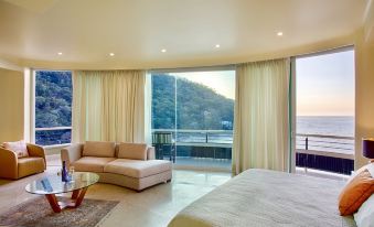 Panoramic Luxury Suite with Ocean, Gardens and Swimming Pool View
