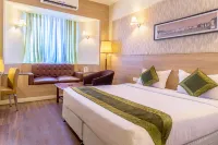 Treebo Premium Grand Emerald Hotels in Chinchvad