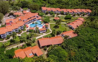 Sugar Cane Club Hotel & Spa Hotels near Mullins Bay