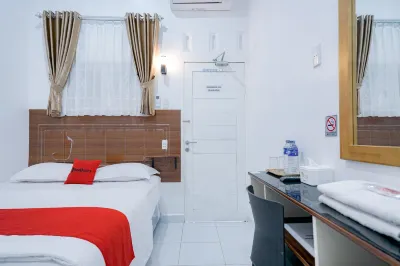 RedDoorz near Pantai Pandan Sibolga Hotel dekat Vie Cafe & Ferboden Distro