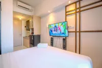 Homey and Relaxing Studio Tokyo Riverside PIK 2 Apartment By Travelio