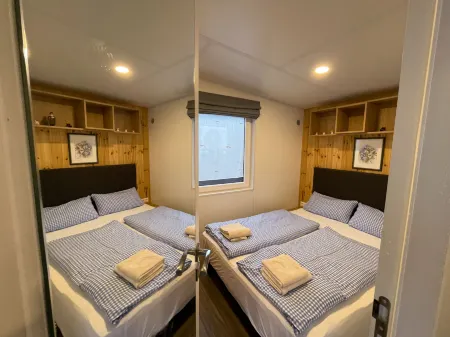 Tiny Haus Sonnenschein Отели в г. Вемдинг