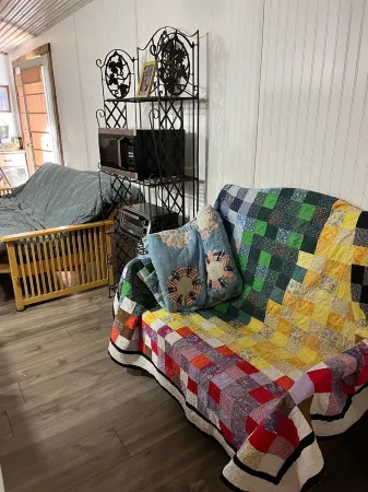 A Minimalist Fancy!  A cute place to lay your head and take a short shower.