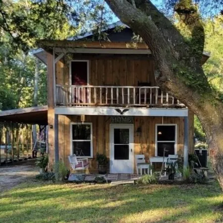 Adorable 2 story lake front setting.