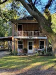 Adorable 2 story lake front setting.