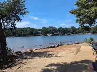 Lake Norman Charming Cottage with AC ,WiFi, Fire Pit and Grill in Mooresville.