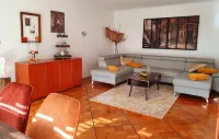 Tasteful and high-quality vacation apartment with large terrace and pool