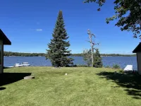 New Listing! The “Looney Bin” Four Season Cozy Lakefront Cabin on Nelson Lake Hotel a Lenroot