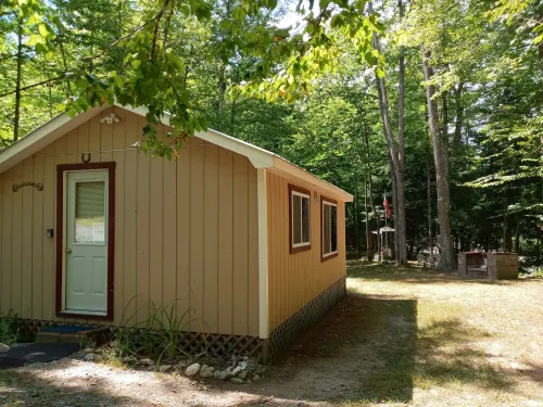White Mountain scenic river camp with cozy cabin
