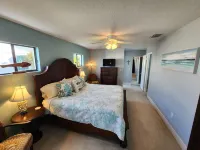 Tranquil Waterfront Pool Home with beautiful views and sunsets and great fishing