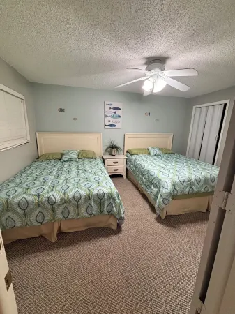 The beach is your backyard! Family size condo on Indian Shores! Sleeps 10!