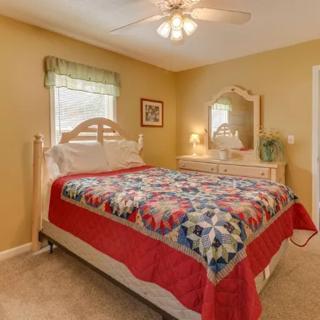 Lakehouse with covered dock, slide, and outdoor kitchen! Close to I-75, trails.