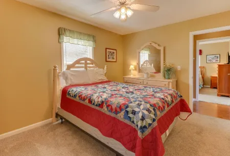 Lakehouse with covered dock, slide, and outdoor kitchen! Close to I-75, trails.