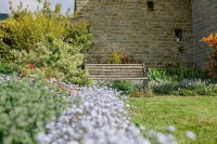 Set on a working Dairy farm  stunning views, a hot tub and pet freindly