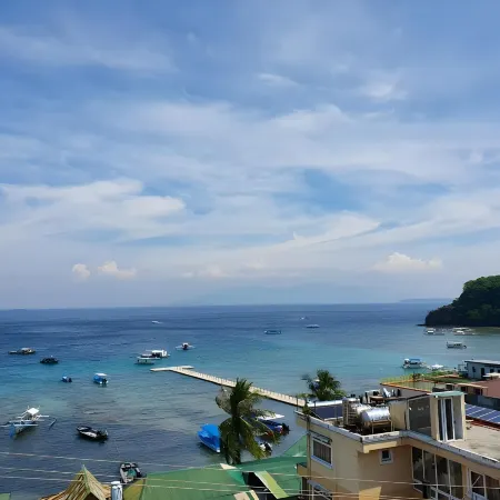 Dream Hotel Puerto Galera Отели рядом с достопримечательностью «Пляж Сабанг»