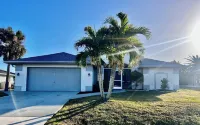 Waterfront 3 bed 2 bath heated saltwater pool home with kayaks and boat dock