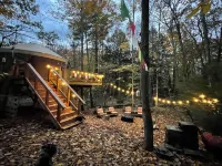 A yurt in the trees.  Close to Portland but close to nature.  Treeyurt Maine Hotels near Eartha Globe