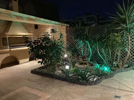 Oasis Garden Apartment Отели в г. Волос