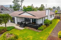 Modern Amenities and Fenced Backyard - Charming Coastal Escape