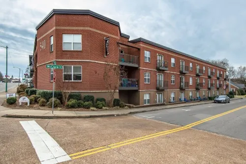 Spacious Living Area with Rooftop Bar Access - Stylish Tranquil Hotels in Clarksville