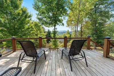 Kim's Cove Motorcycle-Friendly Cabin Features Game Room by RedAwning