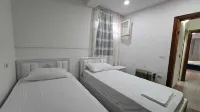 Tirent Apartment-Cozy 2-Bedroom Stay in Don Bosko Hotel di 