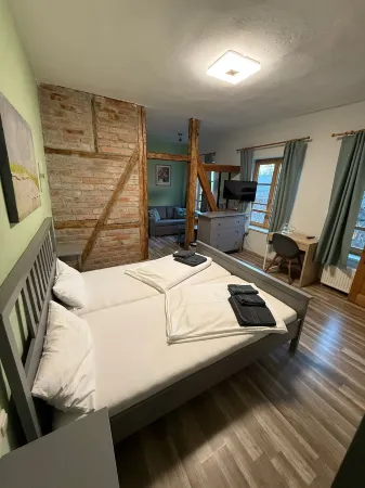 Gasthaus Destille Отели в г. Мюльзен