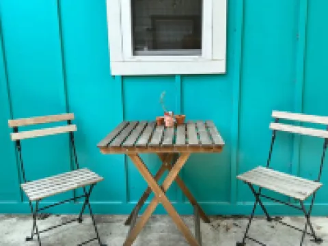 Cozy Patio and Luxurious Amenities - Charming Modern Studio