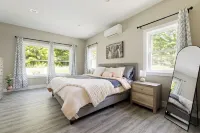 Peaceful 3-bedroom house 8 miles from TC with hot tub and fire pit!