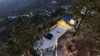 The Dunhill Manor Hotels near Tarkeshwar Mahadev Temple