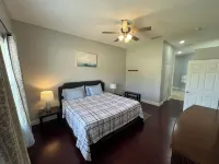 Modern and spacious getaway with a pool and grill