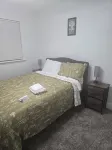 Charming 3-bedroom bungalow Irving WiFi, AC by Airport, Restaurants + Car Rental Hotels near Trinity Rail Express - CentrePort/DFW Airport Station