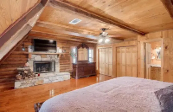 Unwind with the whole family at this serene 5-bedroom cabin retreat