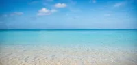 1st Floor 3 BR Ocean View condo sleeps 6. Walking distance to shops/restaurants!