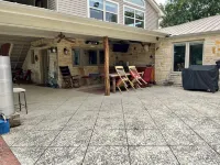 Cozy farmhouse w/pool. Central to museums, golfing, lakes, sports & shopping.