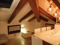 Elegant attic with Dolomites view, relaxation and nature in Levico Terme. Hotels in Levico Terme
