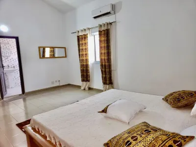 Villa Charmante Avec 3 Chambres et Salles de Bains Privées au Centre D'abidjan ! Hotel a 
