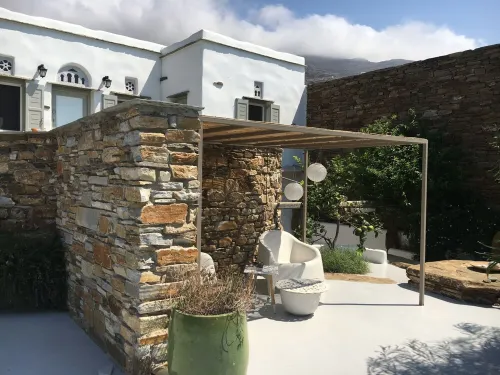 Villa Elia - The charm of Tiniote architecture feet in the water! Hotels in Kardhiani