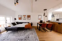 Highlight in Mühldorf - Come4stay Stadtblick - 2 Zimmer Wohnung I bis zu 4 Gäste Hotels in Muhldorf