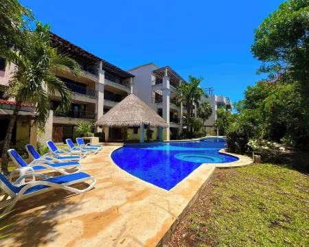 Modern Condo Jungle Retreat Hotels in Puerto Aventuras