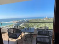 Sheraton ganna inn Hoteles cerca de Playa Mamoura