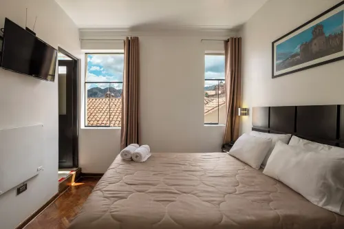 Hostal & Apartments El Triunfo - Bed and Breakfasts