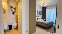 Premium City Escape - Bright Apartments by SunLake Residence