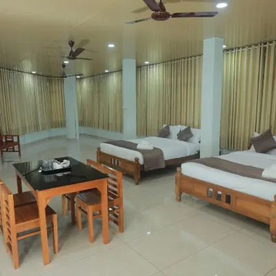 Premier Tourist Home Hotels near St. George Church Mangad